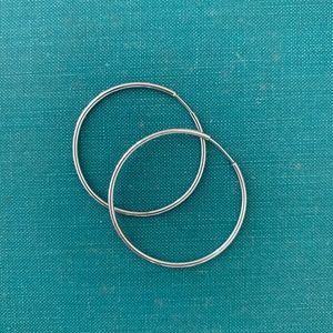 Medium delicate white gold hoops